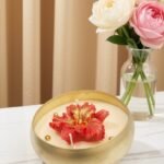 Hibiscus in a round urli